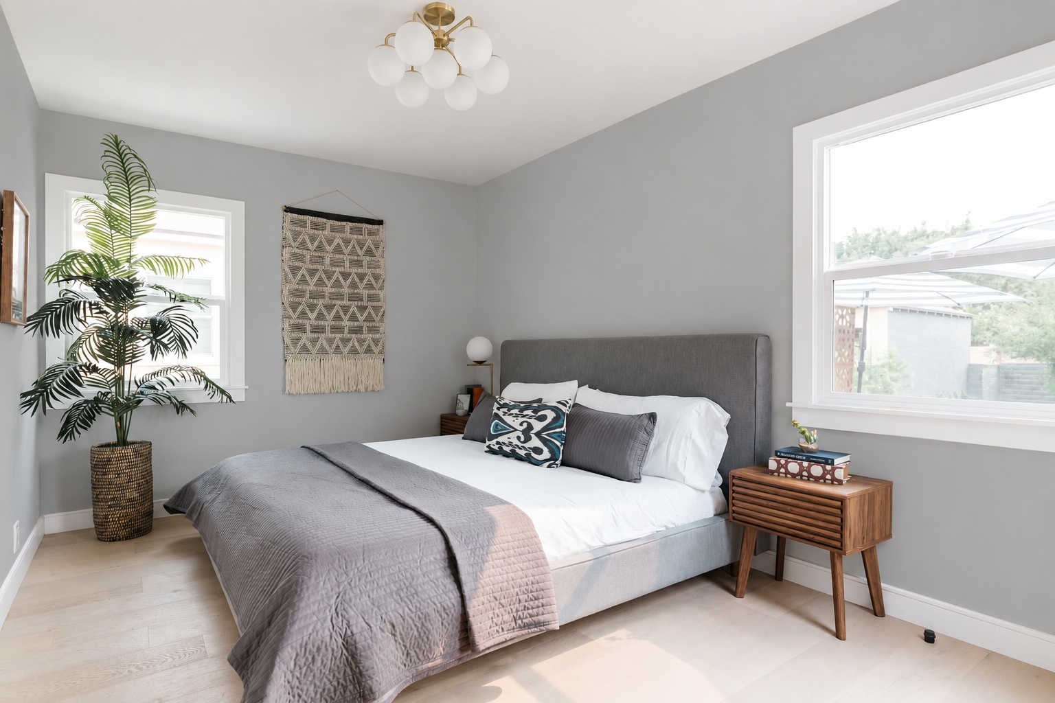 Soft Gray wall preview in the default room during daylight.